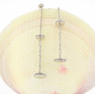 Earrings with chain and hanging disks with diamonds