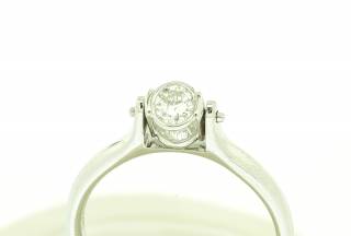 Ring ''Hourglass'' with diamond